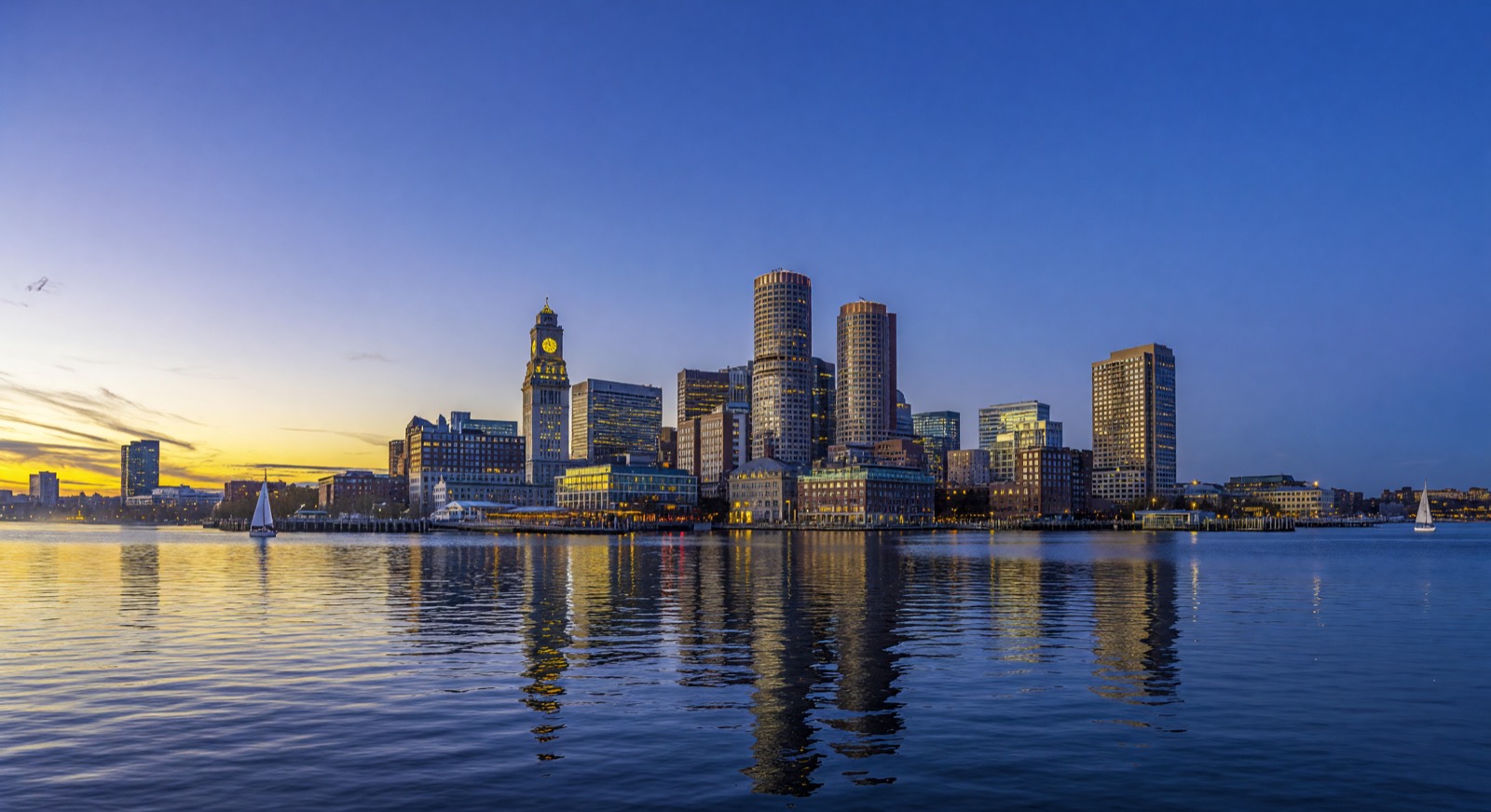 Boston waterfront skyline at dusk for romantic date spots Boston